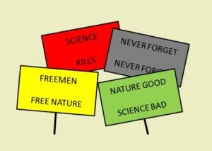 Four protest signs: Science Kills; Freemen, Free Nature; Never Forget, Never Forgive; Nature Good, Science Bad